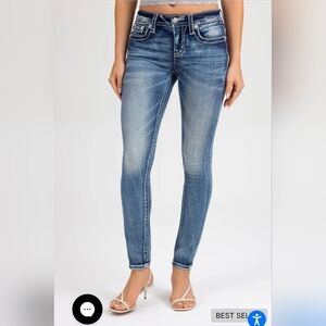 Torn Saddle Stitch Skinny Jeans